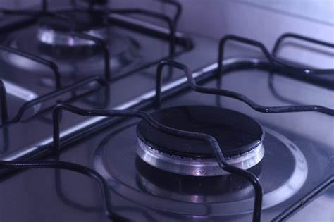 what causes a gas stove to keep sparking